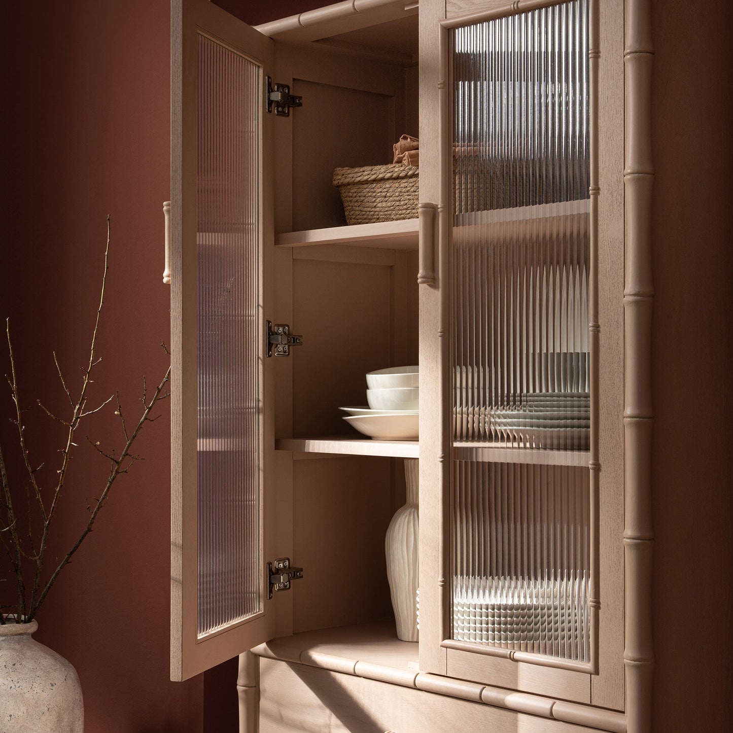 Elstowe Faux Bamboo and Fluted Glass 2-Door Cabinet, Nude Pink